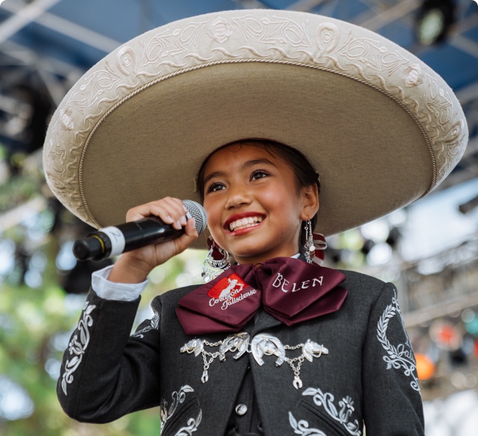 young mariachi singing