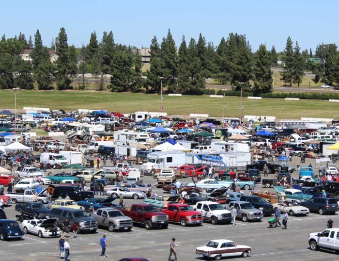 Picture of lots of cars in a parking lot ready for the swap meet