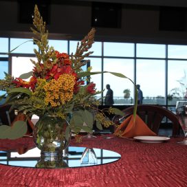 Table with large floral arrangement