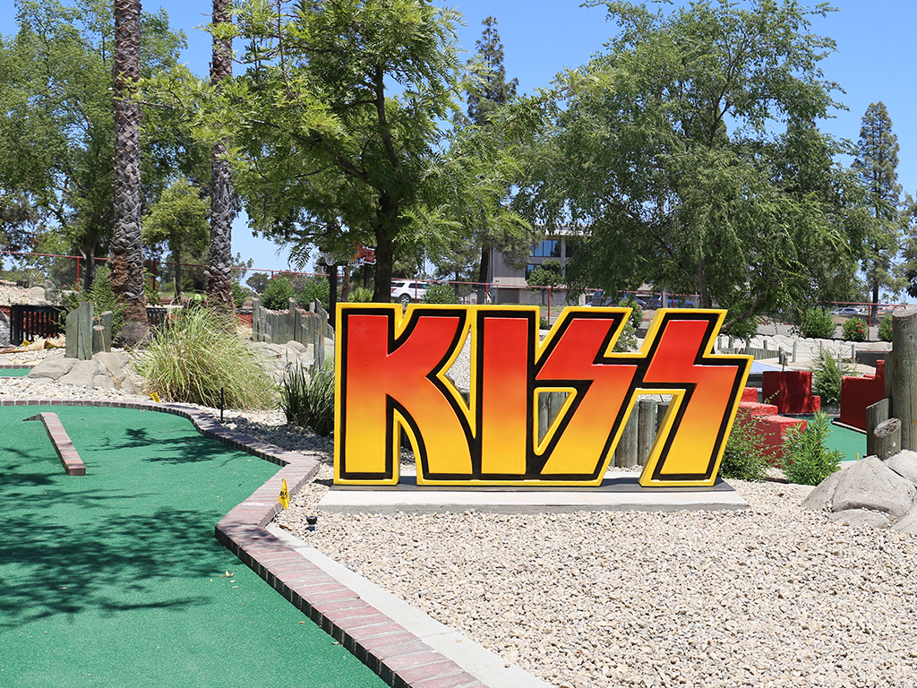 Mini Golf course with Kiss band letter decorations