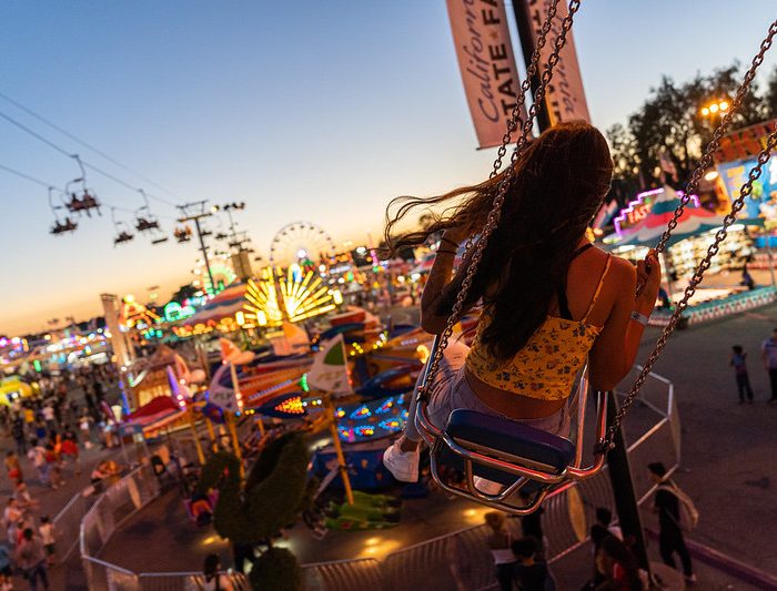 A girl on a carnival ride